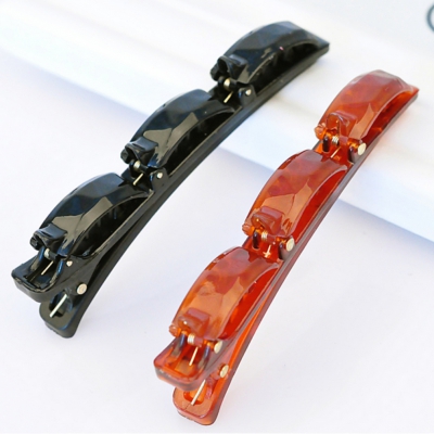 Frisurenhilfe mit Klammern in der Farbe Schwarz oder Braun - 1